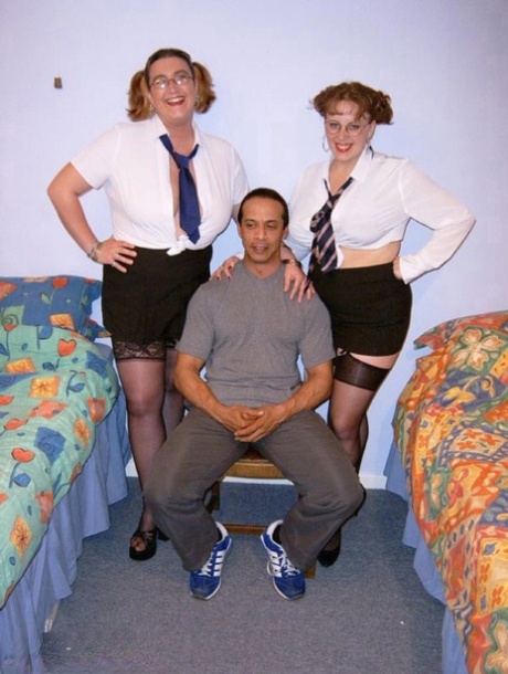 UK chick Curvy Claire and her girlfriend dress as schoolgirls for a double BJ
