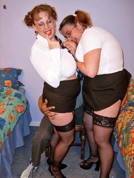 The girlfriend of UK model Curvy Claire dresses up as schoolgirls for a double BJ fashion show.