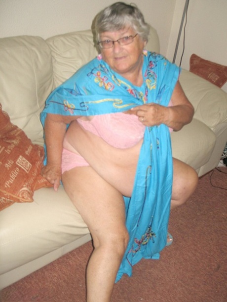 Grandma Libby, who is elderly, removes her pink panties and proceeds to use her nipples for pleasure.