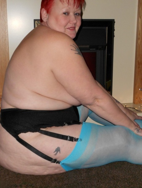 Older redheads are exposed in blue nylons and garters, as seen in the Exposed models.