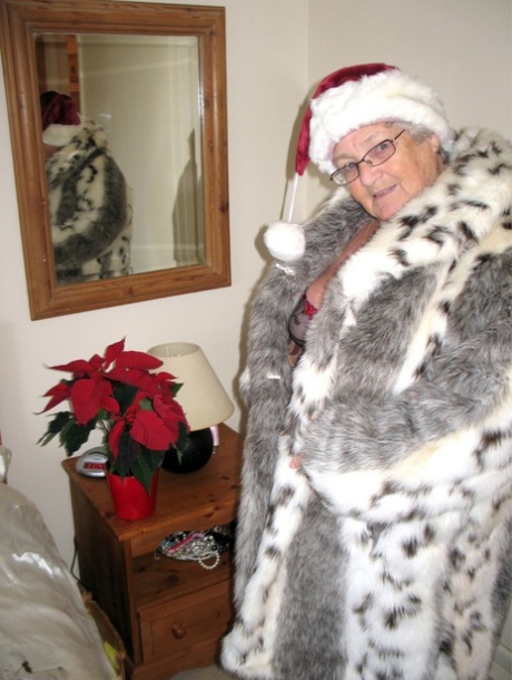 A Christmas hat and hosiery allow Grandma Libby, a British grandmother, to display her plump figure.