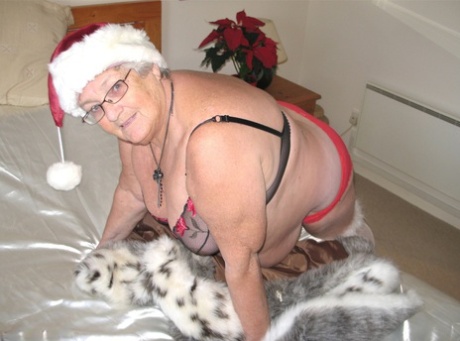 Her mother, Grandma Libby, who is British and has family influence on the UK, exposes her excess physique in clothing that includes both Christmas hats and hosiery.