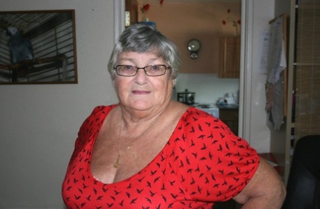Obese nan Grandma Libby parts her shaved pussy after removing satin underwear