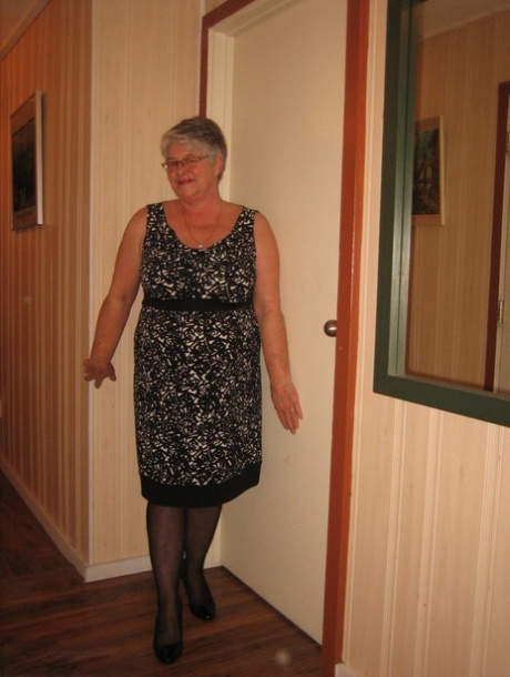The Girdle Goddess Chubby granny is seen naked and her pantyhose are pulled back.