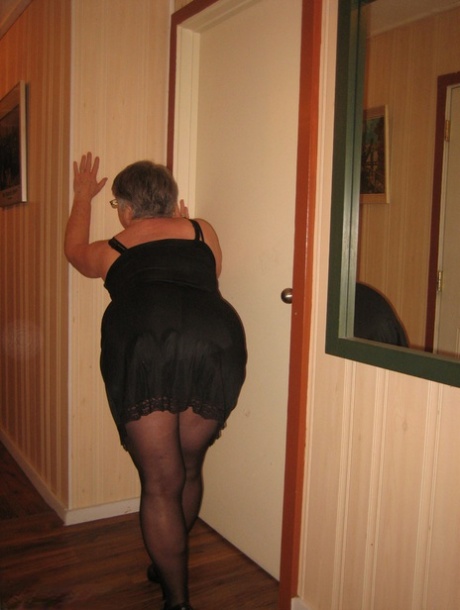 The Goddess Chubby Granny is seen naked while wearing her pantyhose.