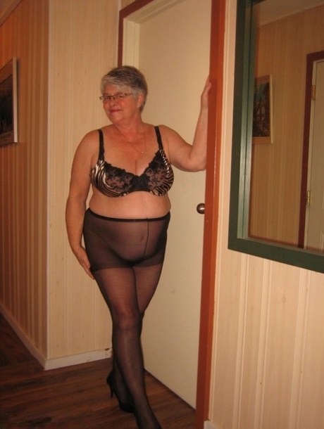 Chubby granny Girdle Goddess gets naked with her pantyhose pulled down