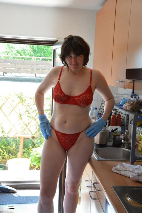Leggy Woman Does Her Housework In Bra And Thong With Matching Heels