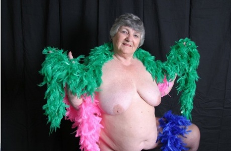 Large breasts are displayed by fat British grandmother, Grandma Libby.