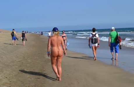 In the meantime, BBW's amateur Naughty runs around on a beach in the buff.