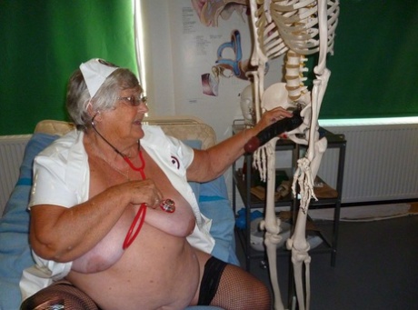 Fat Old Nurse Grandma Libby Attaches A Dildo To A Skeleton For Sexual Relief