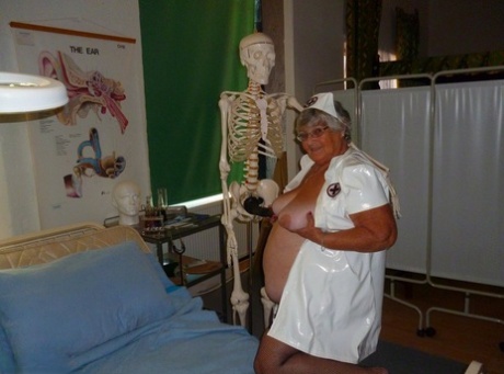 Using a naked body as her comforting prop, Grandma's fat grandmother uses a dildo to ease her sexual needs.