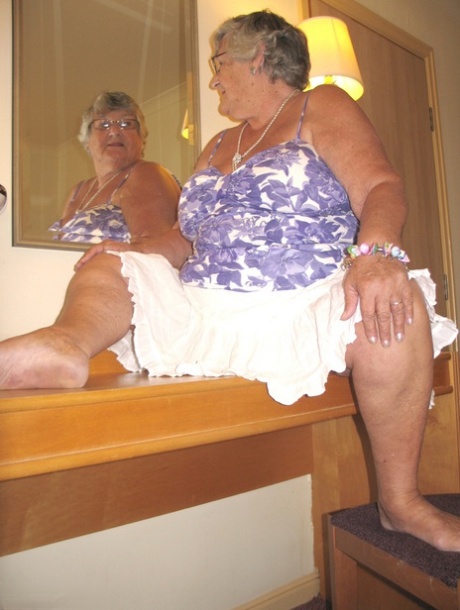 A hotel room is the setting for Grandma Libby, an overweight British woman who disrobes completely.