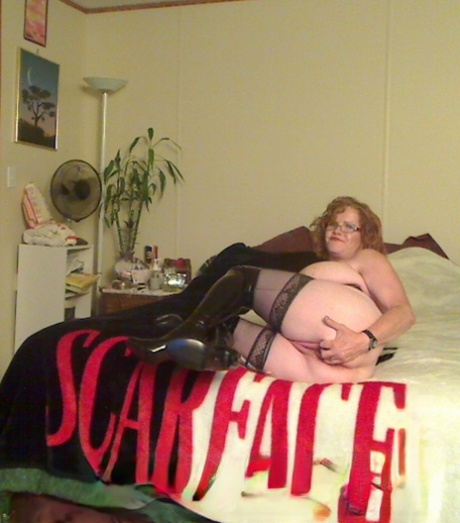 Big tits: Misha MILF, a middle age redhead, loses all those long limbs before she begins using anal dilding.