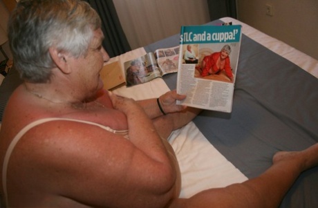Graciel British woman: Fat grandma (left) Grandma Libby masturbates through a girly magazine.