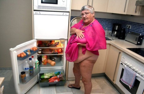 When Grandma Libby, who is fat and from the UK, cleans her kitchen, she goes completely naked.