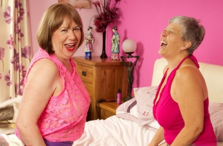 GARNA: Lesbian sex involves the use of double dildo (left) and silver-haired granny Savana, right.
