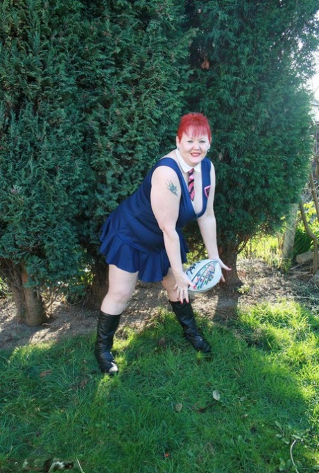 A football and fat redhead named Valgasmic Exposed are played with her tits, but the expression is not in harmony with the subject.