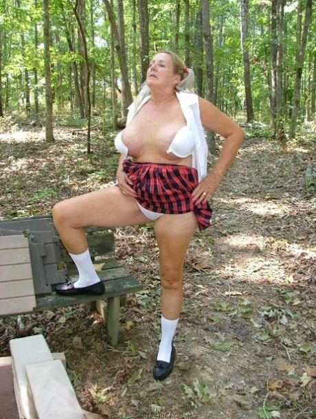 Blonde Nan Adonna Heads Into The Woods For Nude Poses In Schoolgirl Attire