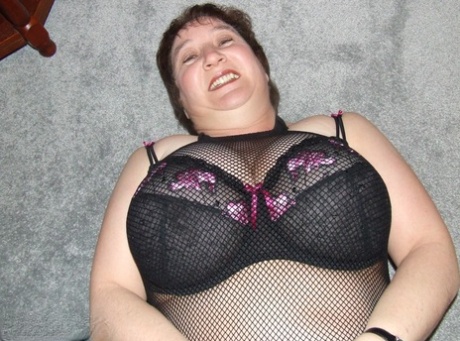 Ex-BBW models dressed in crotchless panties and leather boots.