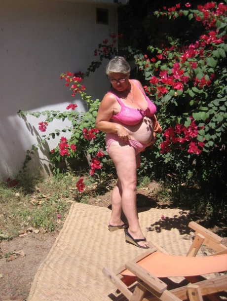 An old-fashioned manner in which the granny of Egypt strips off her sandals on the garden patio.