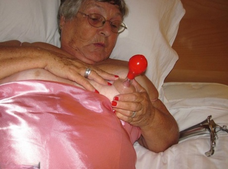 Aggressive: Grandmother Libby sleeps with her old doctor on the bed.