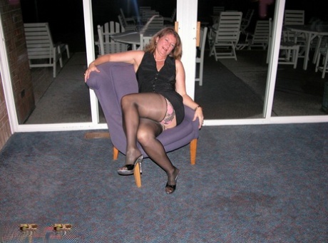 Devlynn, a grown woman, removes her dress and heels while playing with her twats.