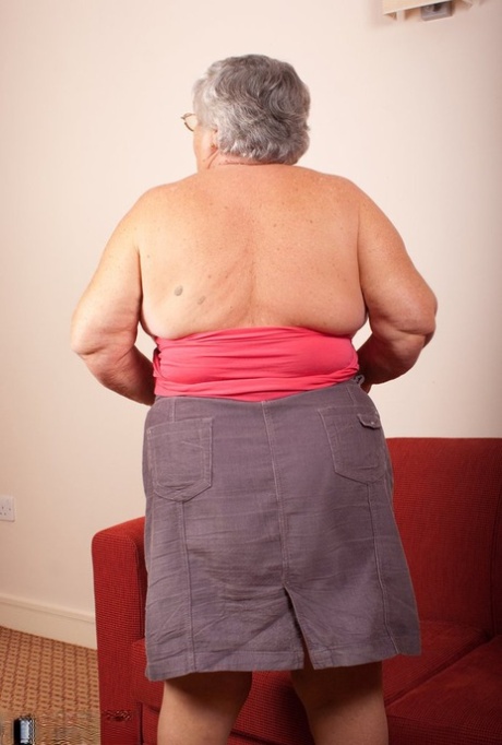 Obese Nan Grandma Libby Gets Totally Naked On A Red Chesterfield