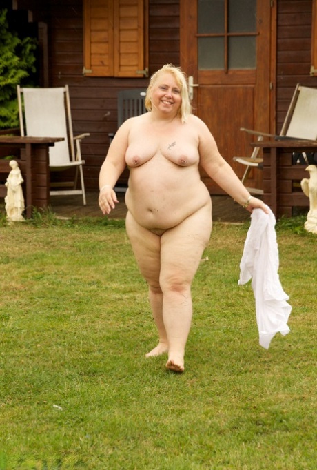 Mature Blonde Lexie Cummings Exposes Her Obese Body On The Back Lawn