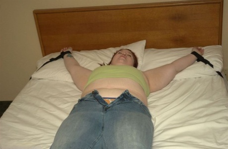 Belonging: This amateur BBW Inkedoracle is fastened to her bed with clothes that just go away.