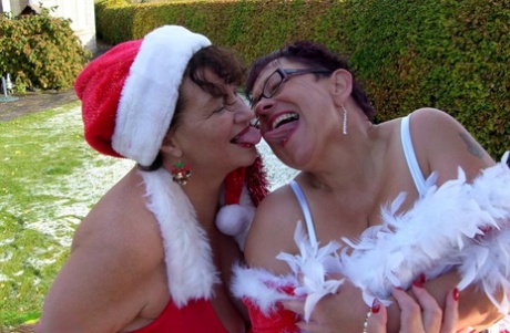A fat prostitute named Warm Sweet Honey has outdoor lesbian sex during the Christmas season.