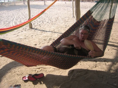 Obese Nan Girdle Goddess Bares Her Large Tits And Fat Belly On A Hammock