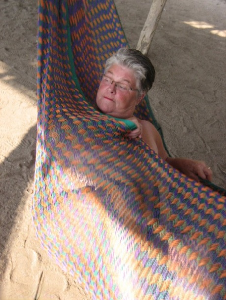 Obese Nan Girdle Goddess Bares Her Large Tits And Fat Belly On A Hammock