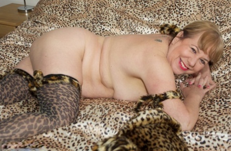 Underwear of animal prints, Speedy Bee's self-proclaimed hero for UK amateur purposes goes naked on top of her bed.