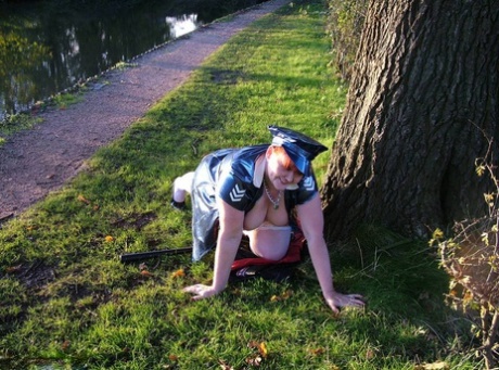 Valgasmic Exposed, a fat and overweight redhead, exposes herself on a canal path.