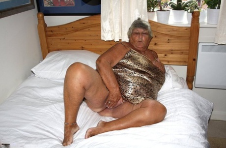 Silver Haired Senior Citizen Grandma Libby Masturbates On Her Bed With A Toy