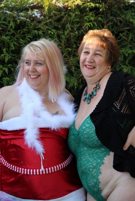 Fat granny Kinky Carol and her BBW girlfriend exposed their breasts in front of the couple in a yard.