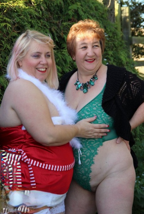Fat grandmother Kinky Carol and her BBW girlfriend exposed their breasts in a yard sale last year.