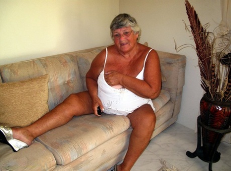 Fat Lady Grandma Libby Bares Her Saggy Tits And Big Ass While On A Couch
