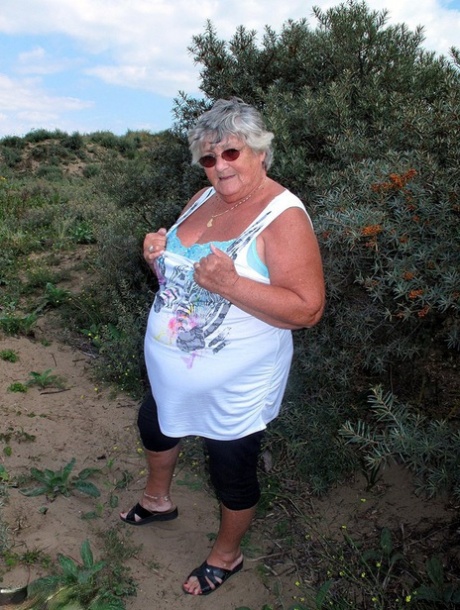 Grandma Libby, who is fat and British, goes completely naked while hiking in nature.