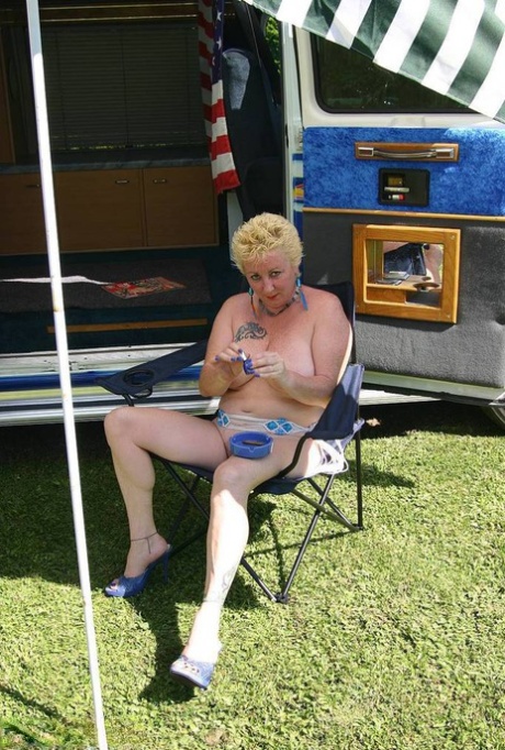 At a B class camper van, Mary Bitch is seen with her large breasts and pusses in an unintended turn of events.