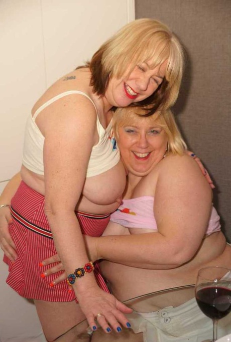 The mature plump and blonde BBW Lexie Cummings engages in lesbian intercourse.