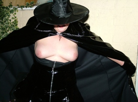 Older Redhead Valgasmic Exposed Displays Her Pussy In Cosplay Wear By The Shed