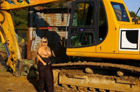 Nude Chrissy, a blonde amateur, exposes herself in shades while wearing heavy equipment.