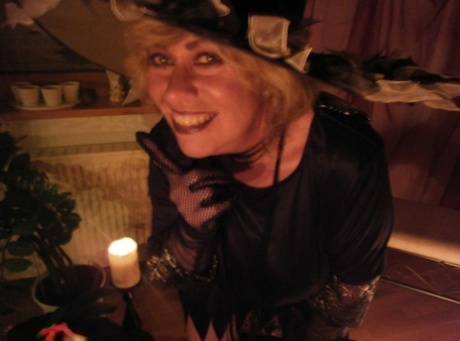 Wild Mature Witch Caro Sticking A Fat Dildo Up Her Juicy Twat For A Halloween