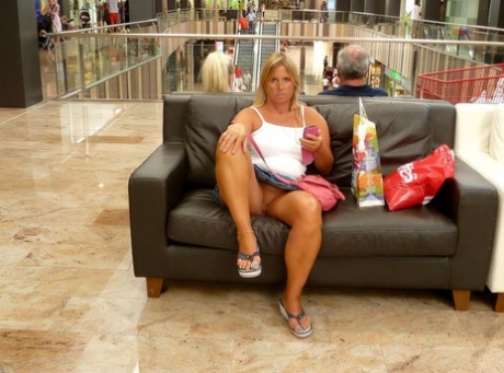 Naked nude older woman: Chubby bares her legs in public for the first time.