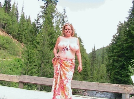 Busty Granny Misha MILF Exposes Herself While On A Bridge Over Top Of A River