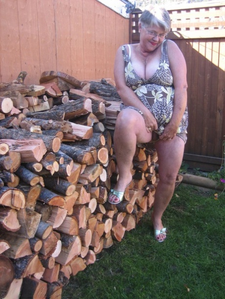 Brazen Older Granny Strips Off By The Wood Pile To Show Off BBW Tits & Big Ass