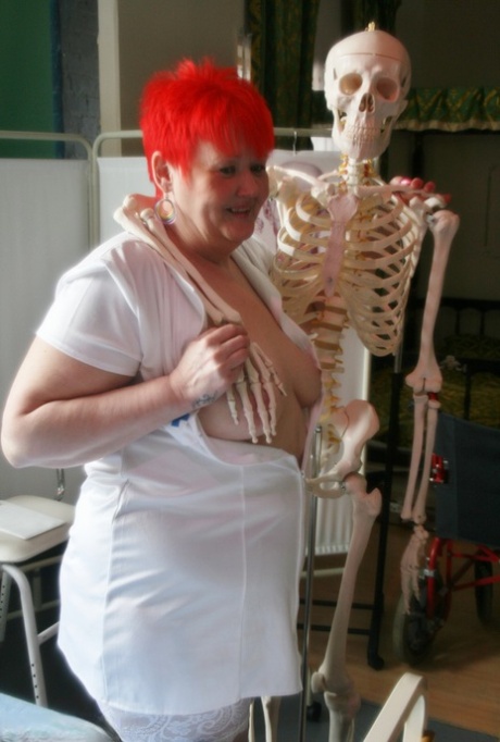 An elderly woman dressed in white stockings and lurid behavior is disturbed by a skeleton.