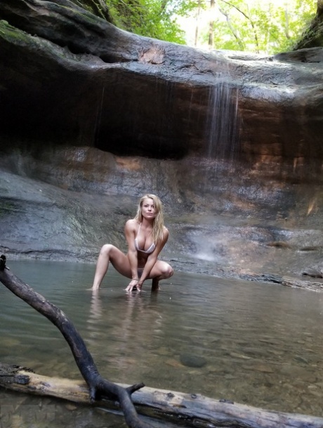 Meet Madden, a gorgeously beautiful bikini girl, performs hot solo poses after backpacking.