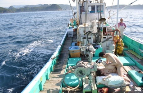 Fighting it: Japanese gangsters Miki Uemura and Hinata Serinaki enjoy their time on the fishing board.